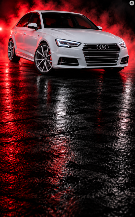Audi A4 B9 in red studio lighting